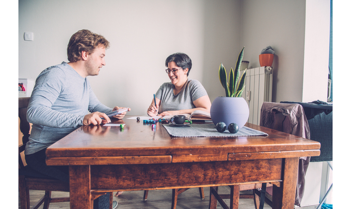 A Relaxed Millennial Couple Playing a Role Play at Home, Europe