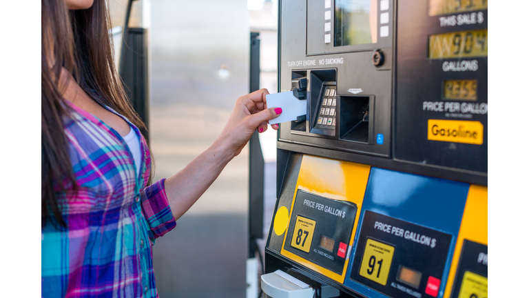 Using card at gas pump. (Getty Images)