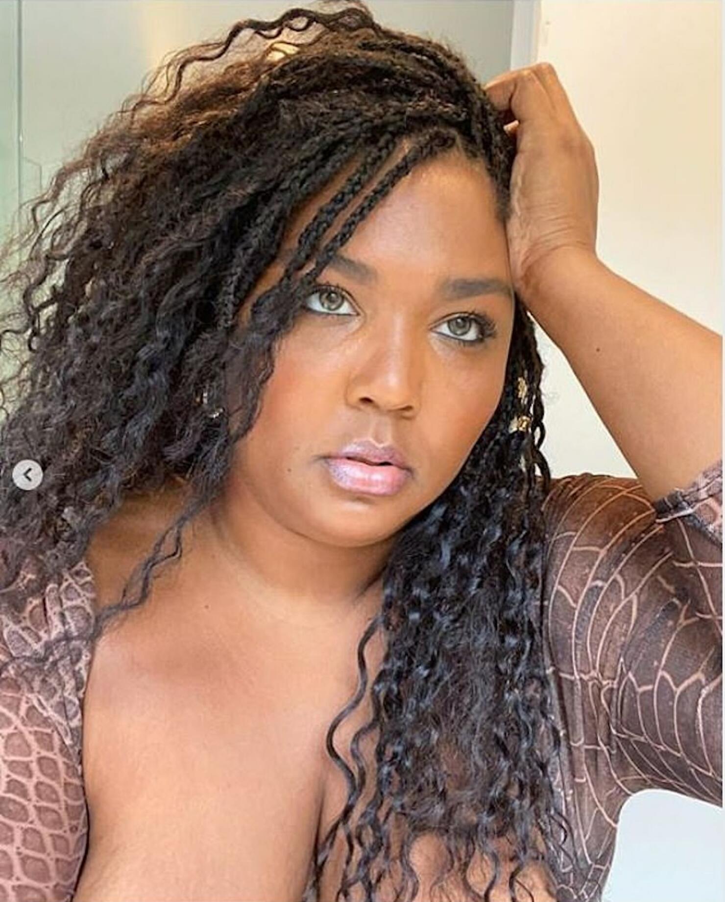 Lizzo Looks Dramatically Different In Sexy, Skin Tight Bodysuit Photos