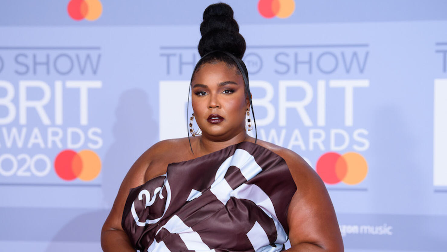 Lizzo Looks Dramatically Different In Sexy, Skin Tight Bodysuit