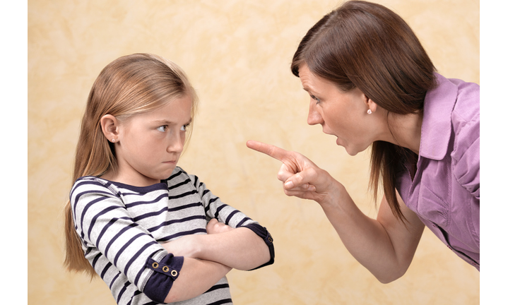 Daughter being told off by her mother