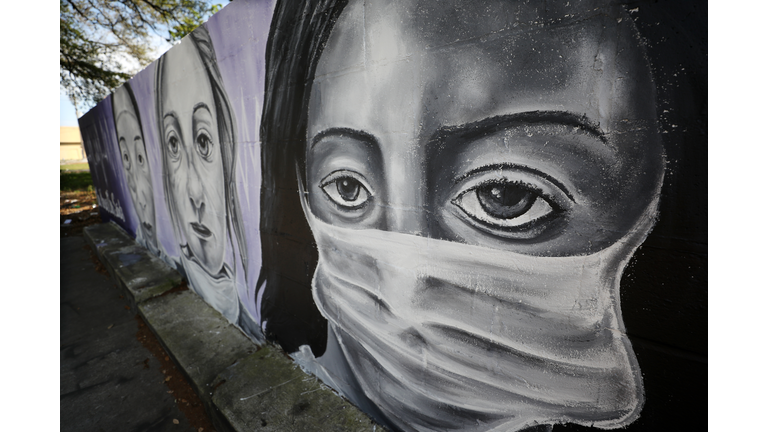 A painting by the graffiti artist Bandit titled “Our Nurses, Our Saints” is seen on a wall in the lower ninth ward on April 03, 2020 in New Orleans, Louisiana. (Photo by Chris Graythen/Getty Images)