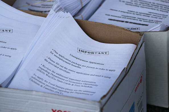 People Line Up For Unemployment Applications In Hialeah, FL During COVID-19 Crisis