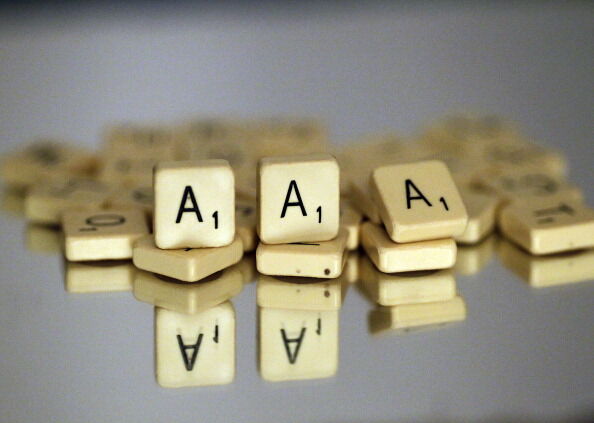 Scrabble "A" lettered tiles are displaye