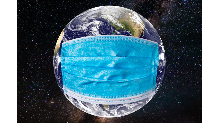 Planet earth with a medical mask. World epidemic concept