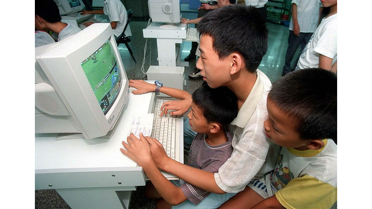 Children play computer games