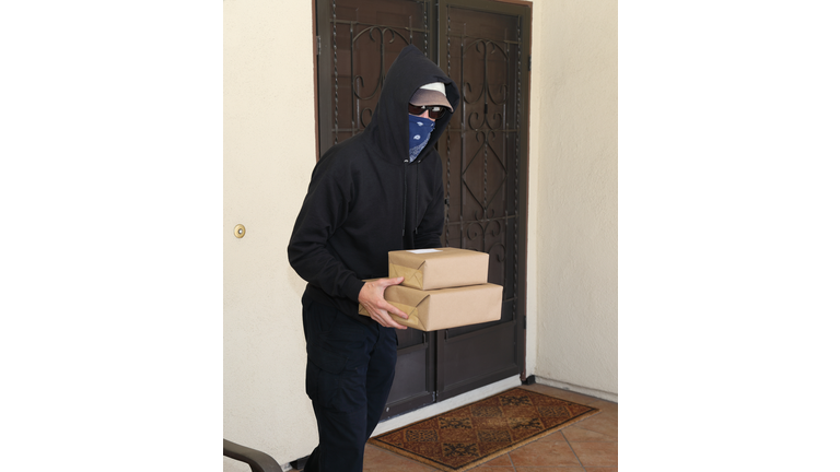 Porch Pirate Steals Packages with Mask Vertical