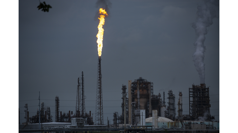 A gas flare from the Shell Chemical LP petroleum refinery illuminates the sky on August 21, 2019 in Norco, Louisiana. (Photo by Drew Angerer/Getty Images)