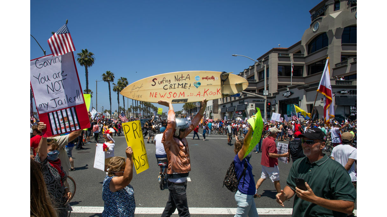 Protest To Reopen California Businesses, Beaches, And Parks Held In Huntington Beach