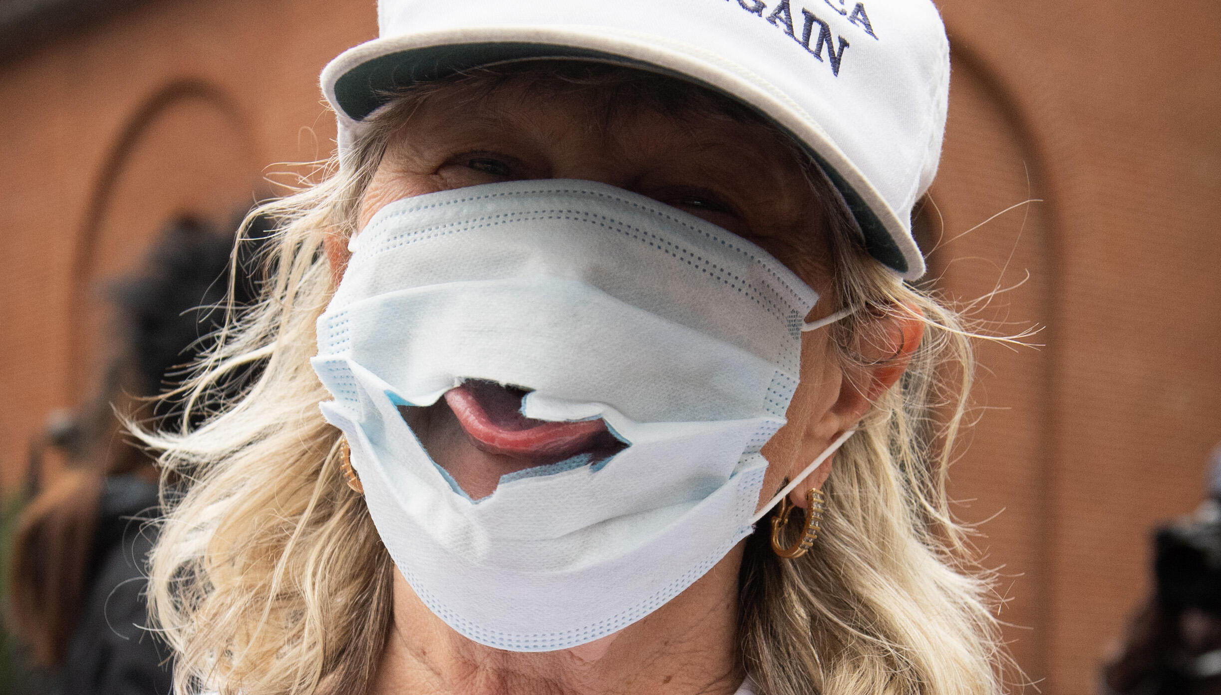 Face Mask With Drinking Hole Pattern