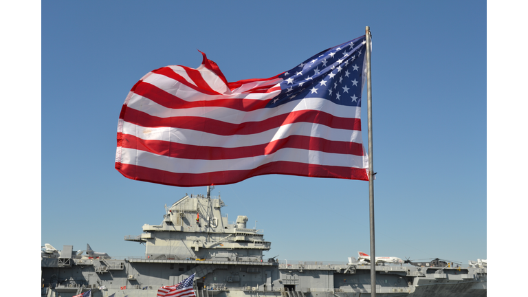 Stars and Stripes in front of USS Yorktown via Getty Images