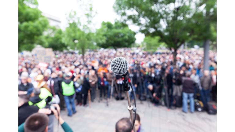 Microphone Against Crowd During Event