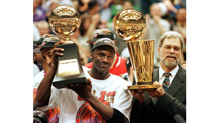 In this 14 June 1998 file photo, Michael Jordan (L