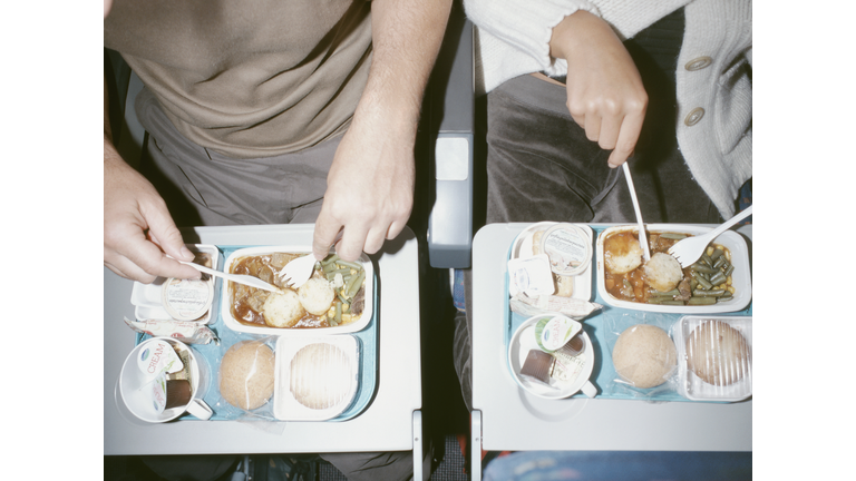 People Eating Airline Food