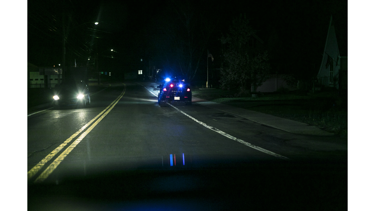 Roadside Car with Police at Night