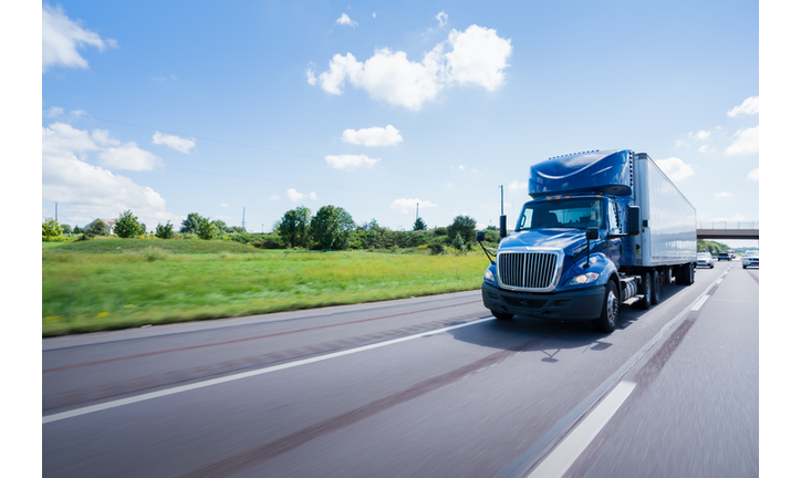 Semi truck 18 wheeler on highway with copy space