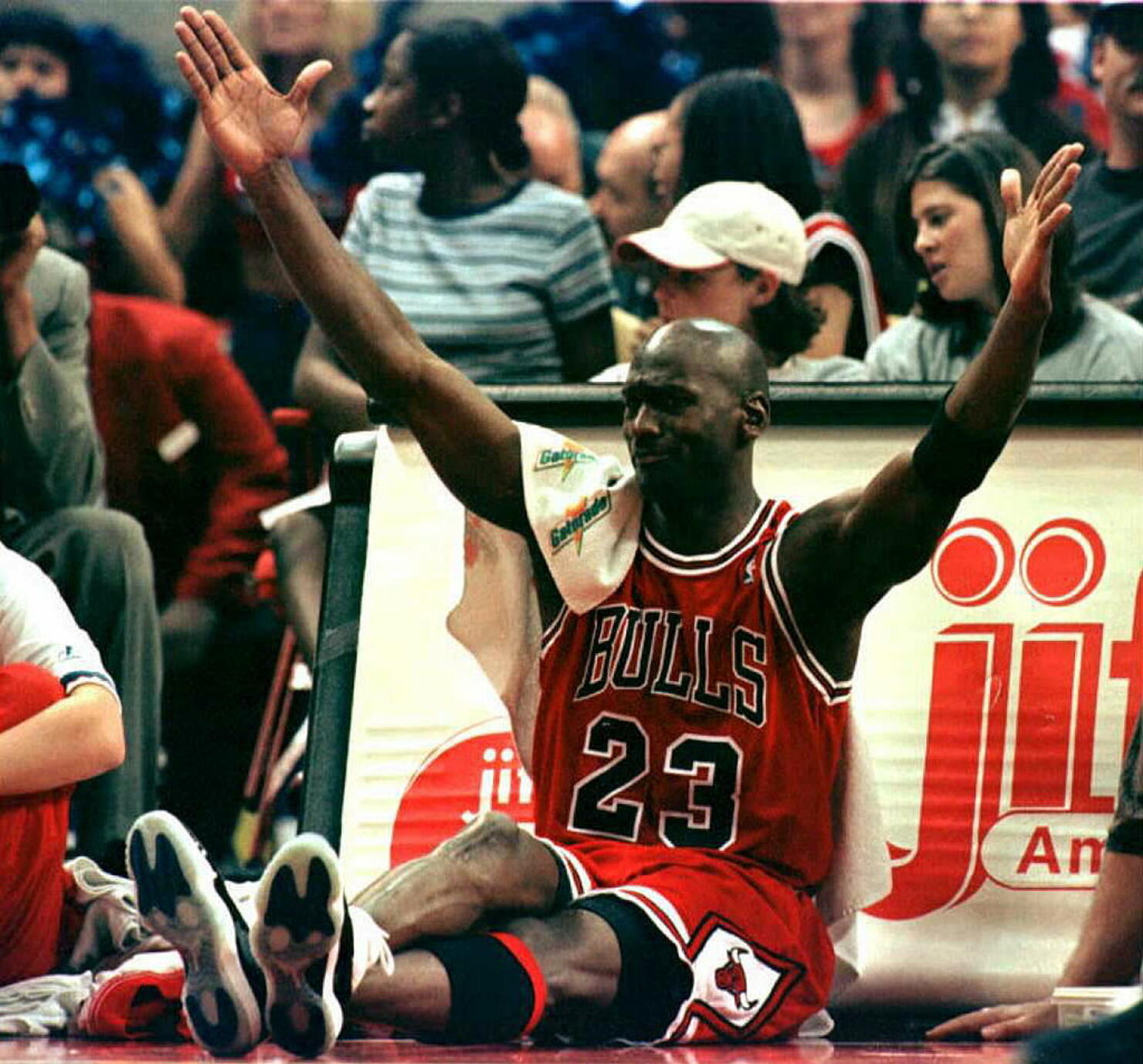 While sitting by the scorers table before returnin