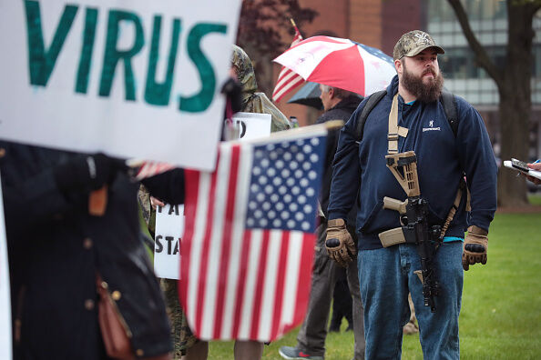 Protestors Rally At Michigan State Capitol Against Shelter-In-Place Orders