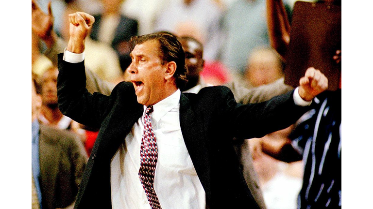 Houston Rockets head coach Rudy Tomjanovich celebr