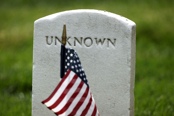 Arlington National Cemetery Holds Annual Flags-In To Honor Fallen For Memorial Day