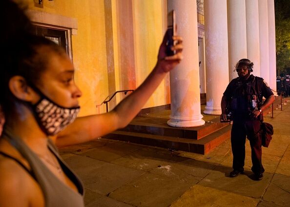 Protesters face off with police across from the White House on May 30, 2020 in Washington DC.