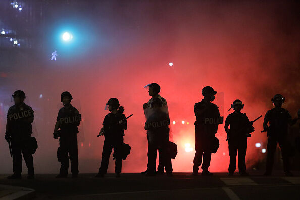 Police hold a perimeter near the White House as demonstrators gather to protest the killing of George Floyd in the morning hours on May 31, 2020 in Washington, DC.