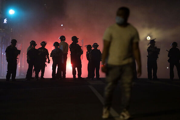 Police hold a perimeter near the White House as demonstrators gather to protest the killing of George Floyd in the morning hours on May 31, 2020 in Washington, DC.