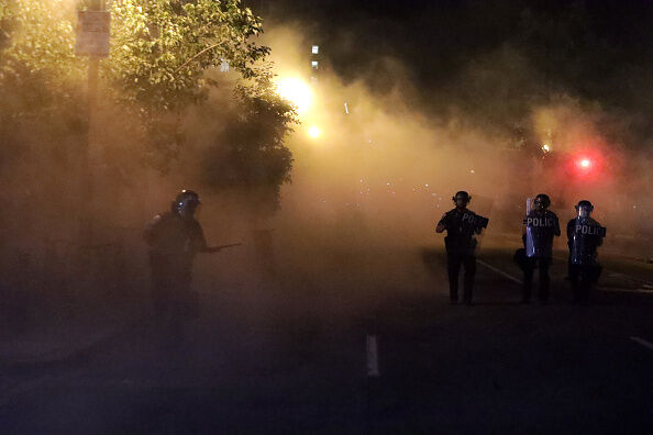 Police hold a perimeter near the White House as demonstrators gather to protest the killing of George Floyd in the morning hours on May 31, 2020 in Washington, DC.