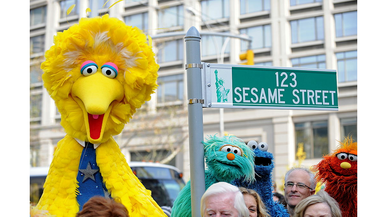 Big Bird (L) and other Sesame Street pup