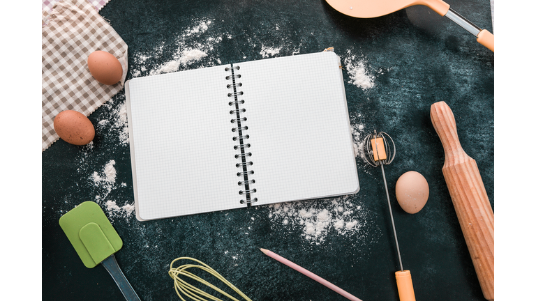 bakery ingredients and open notebook