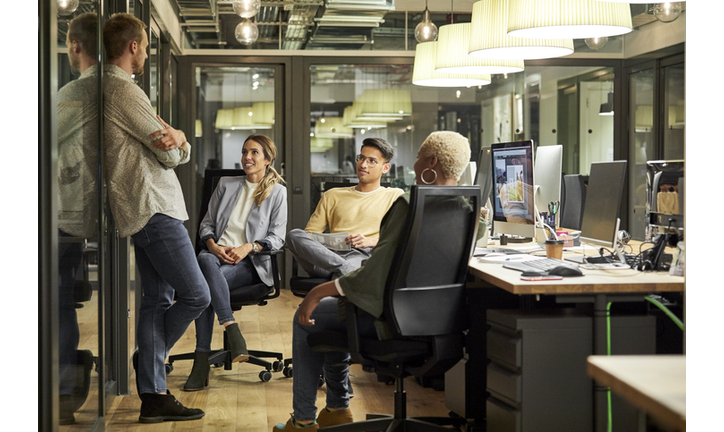 Business people discussing in creative office