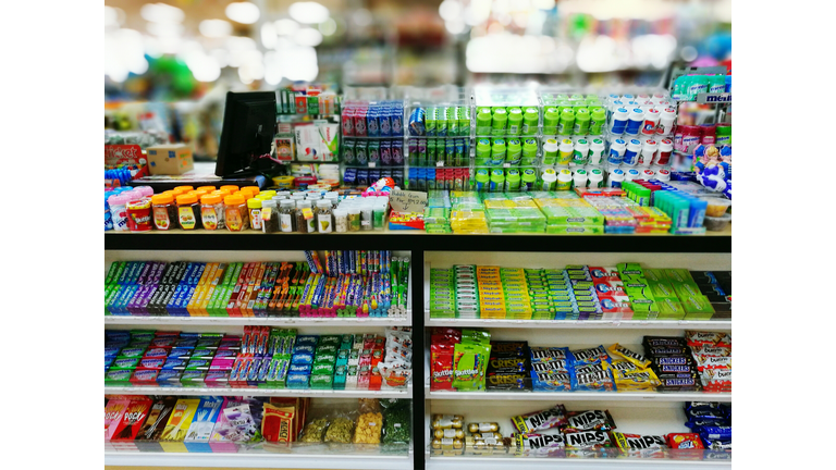 Various Candies On Shelf For Sale At Store