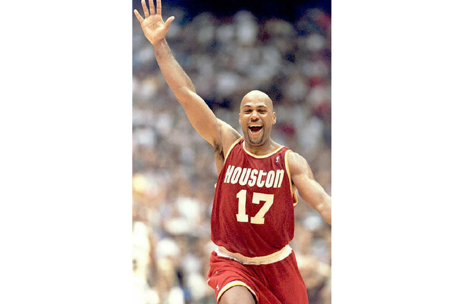 Mario Elie of the Houston Rockets celebrates 22 Ma