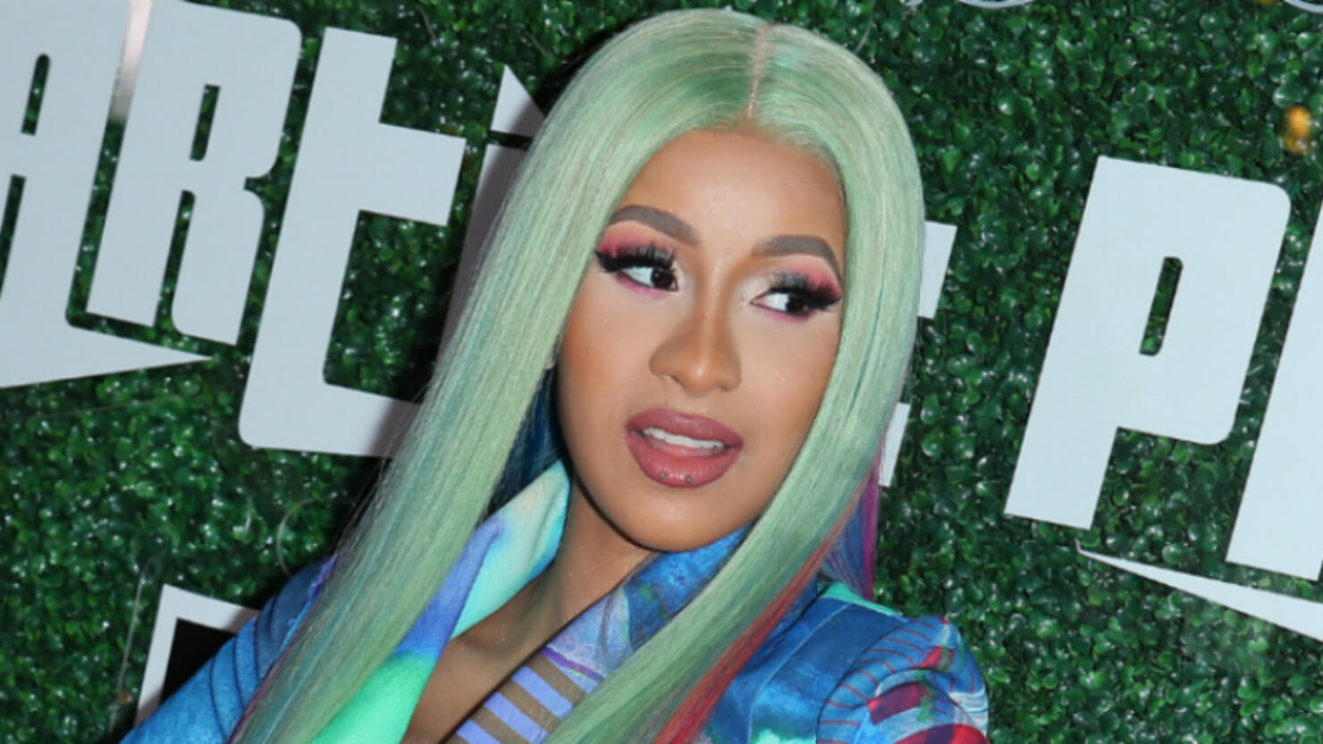 Cardi B Shows Off Peacock Hip Tattoo After 'Hours of Pain