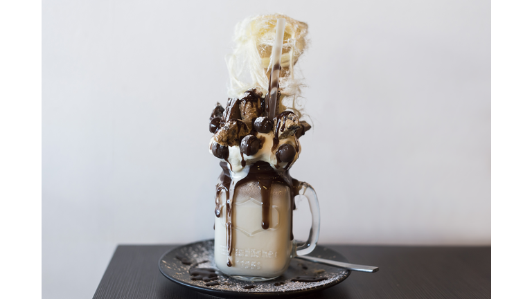 Decadent chocolate mega milkshake with biscuits and Persian fairy floss