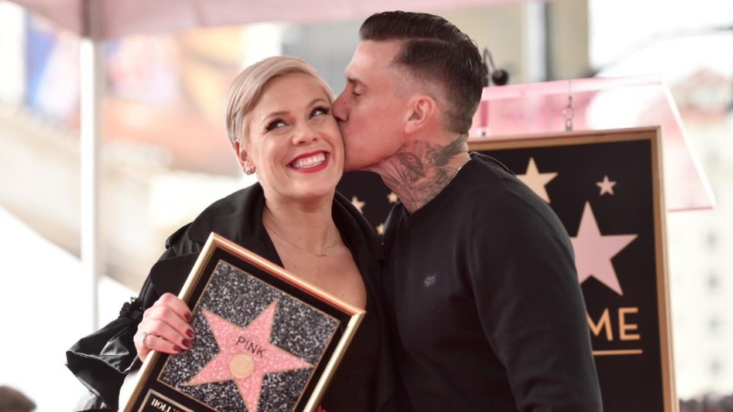 Pink keeps fit by working out with husband Carey Hart just days