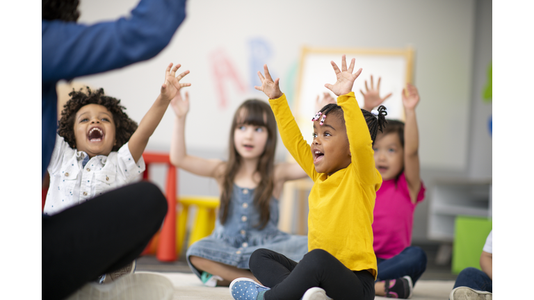 Multi-ethnic group of preschool students in class