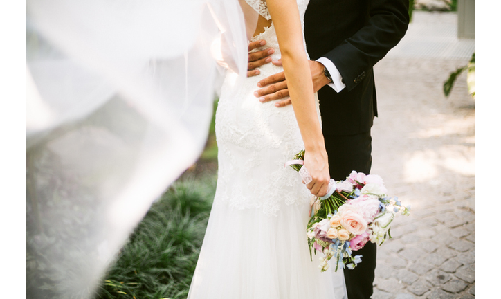 Bride and groom hugging