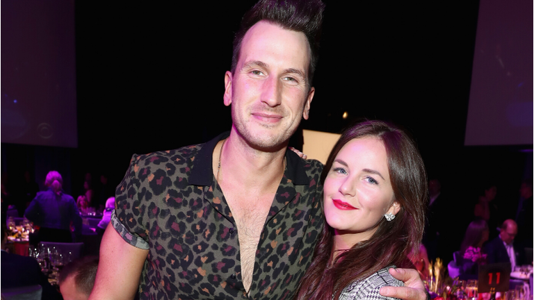 Russell Dickerson Shows Off Wife's Growing Baby Bump In New Photo 