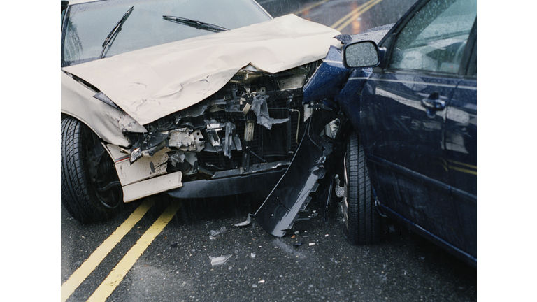 Two damaged cars after crash, close-up