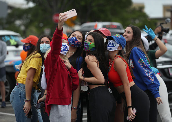 Parade Of Graduating High School Seniors Cheered By Community In Florida