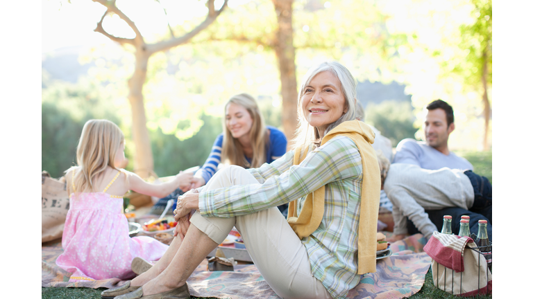 Family picnicking together outdoors