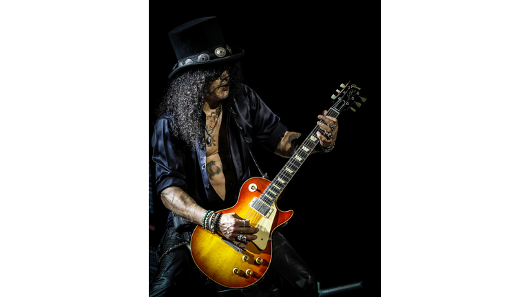 Slash performing with a '59 reissue Les Paul