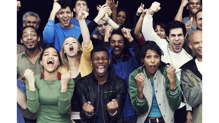 Crowd of sports fans cheering