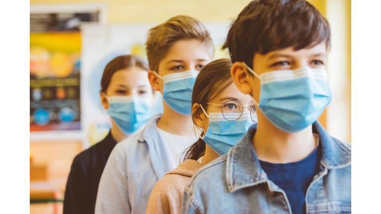 Group of student at a high school standing in line