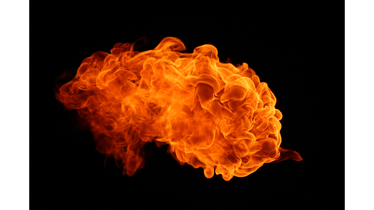 Close-Up Of Fire Against Black Background