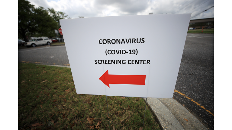 A sign is seen at a drive-thru Coronavirus COVID-19 testing station at West Jefferson Medical Center on March 17, 2020. (Photo by Chris Graythen/Getty Images)