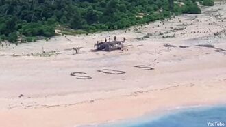 Watch: Stranded Sailors Saved After Searchers Spot 'SOS' Signal in the Sand