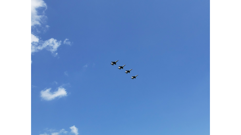 Low Angle View Of Airplanes Flying In Sky