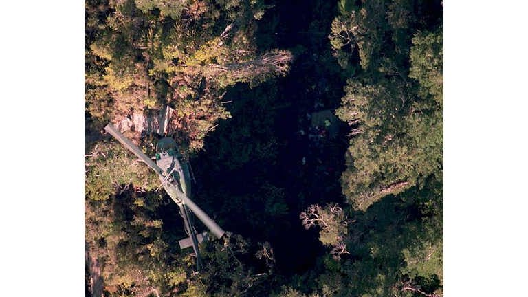 A New Zealand air force rescue helicopter hovers a